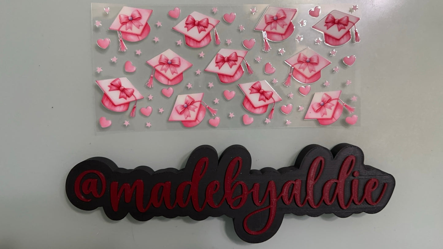 pink graduation caps